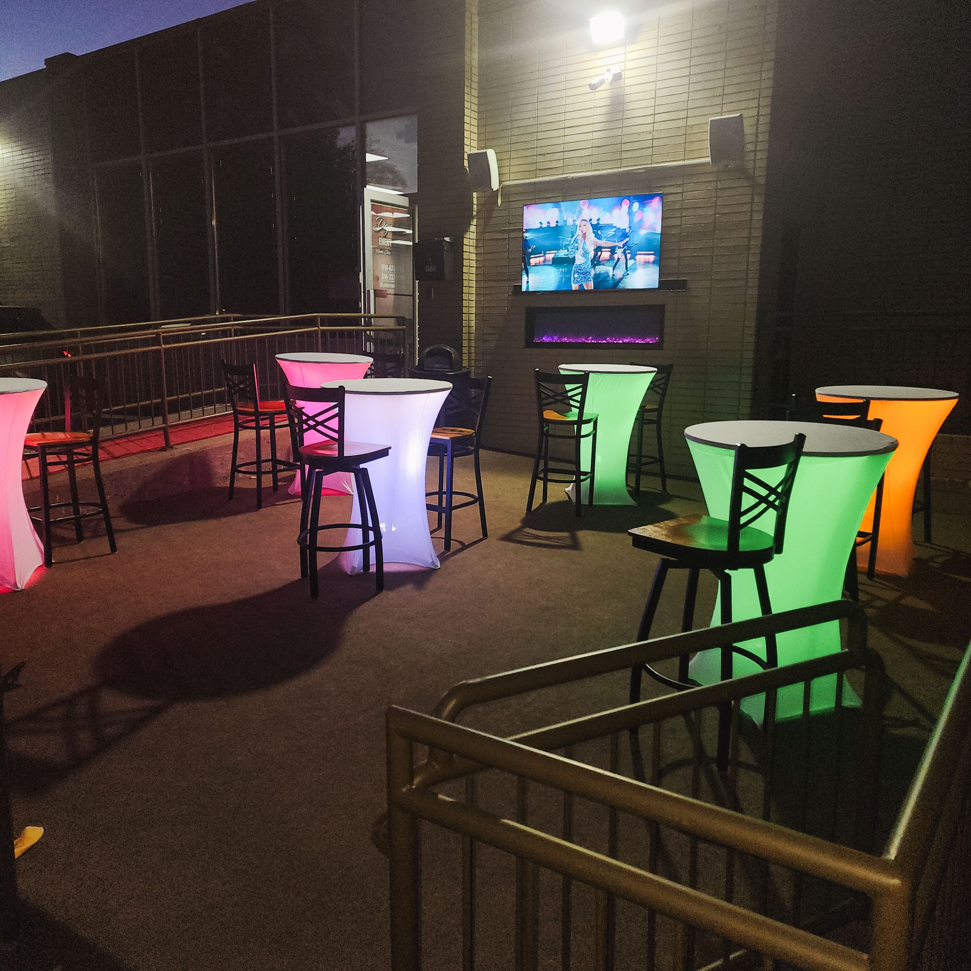 Deja Vu Event Space — modern event space with glowing neon tables